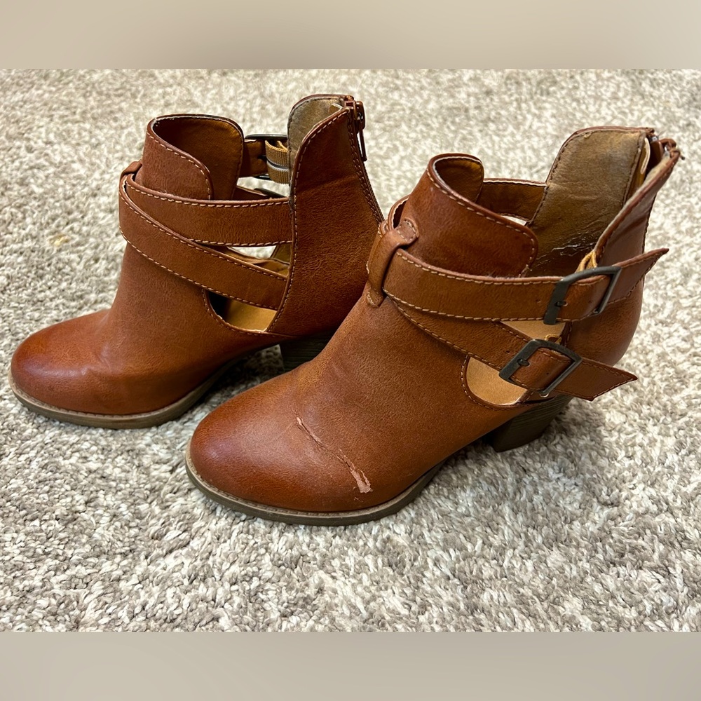 Maurice’s size 7 cognac ankle booties with cross-cross and buckle details